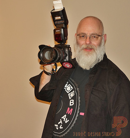 "Santa dressed as a photographer"